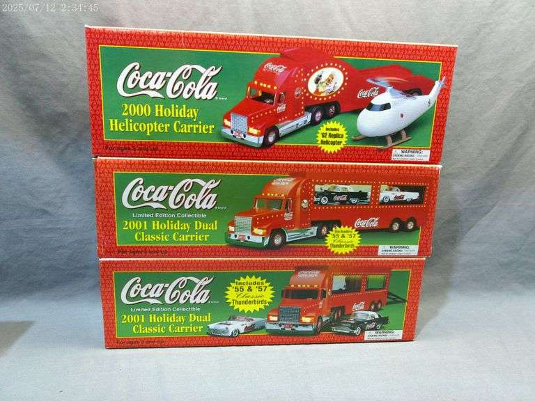 3 Coca Cola holiday carriers. Battery operated, not included. In boxes