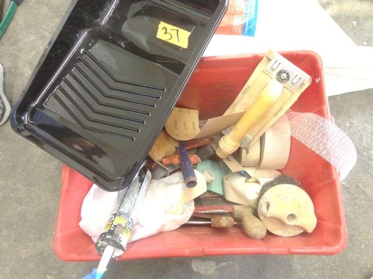 Lot of painting supplies. Includes plastic roll, drop clothes, painting tools, and miscellaneous. Se