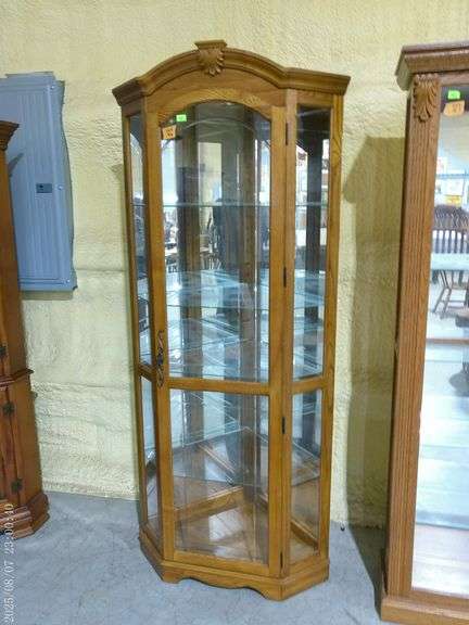 504- Lighted Corner Display Case with Glass Shelves. Approximately 34" wide x 19.5" deep x 77.5" tal