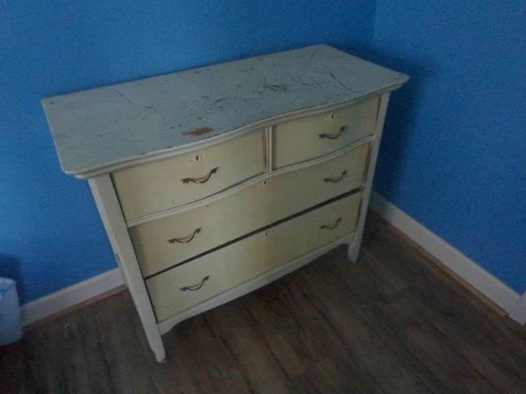 4 Drawer Dresser. Needs Refinished. 40" long x 35" tall x 19" deep. See pictures for condition. Loca