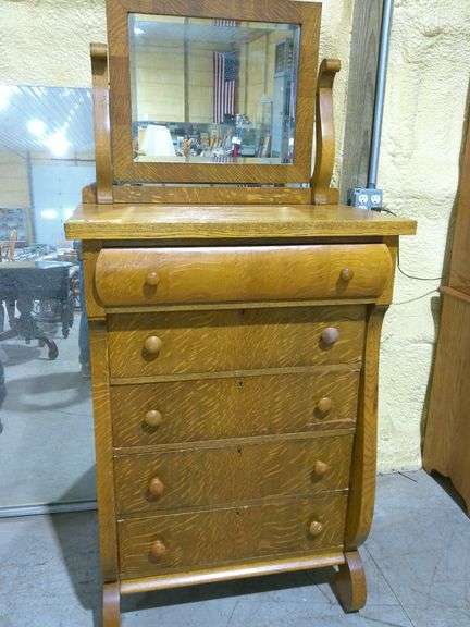 452 - Antique highboy dresser tiger oak. Has 4 white casters. Very nice condition, drawers need work