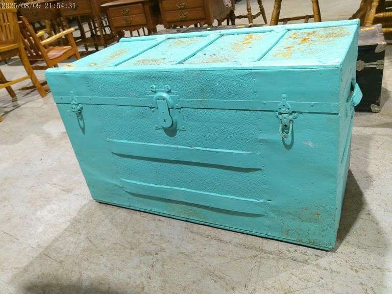456 - very old trunk that has been painted. Handles are intact on the ends