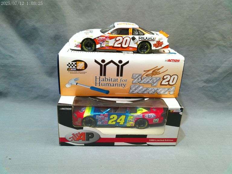2 die cast 1:24 scale cars - Tony Stewart, Jeff Gordon. In boxes