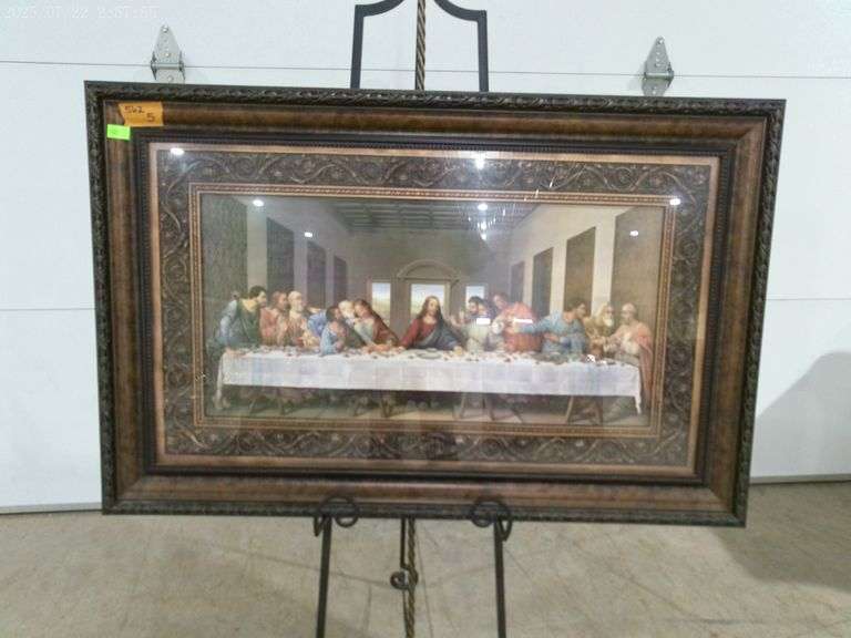 562 - The Last Supper in beautiful ornate frame 42"x27" on an iron easel 60" tall