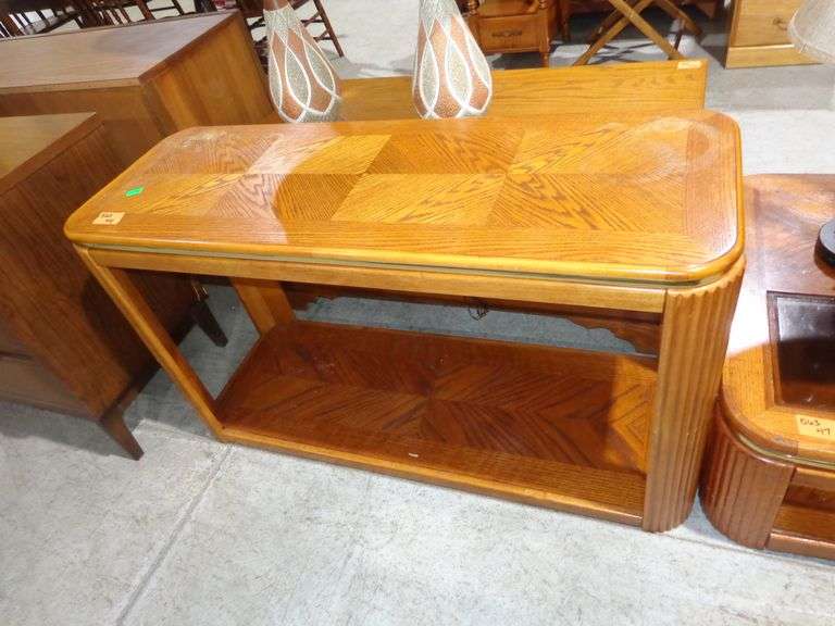 563 - sofa table with some water damage on top