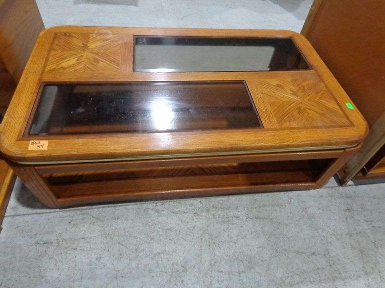563 - 49"x30" wood and glass coffee table