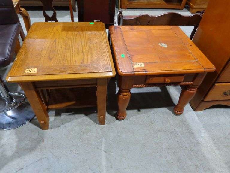 563 - Pair of end tables, not matching. Both show wear - oak is 22"x26"; table with drawer is 23"x23