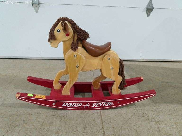 562 - Radio Flyer rocking horse in fair condition. Saddle comes off, some scuffs on rockers. Cute pi