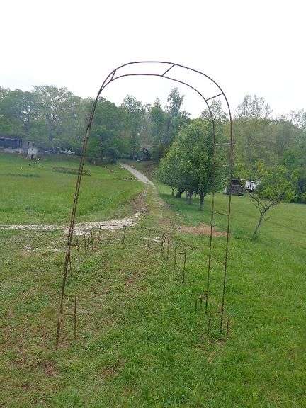 2 Steel Archways. Mud packed in ends of metal that slide together. Will need some TLC.