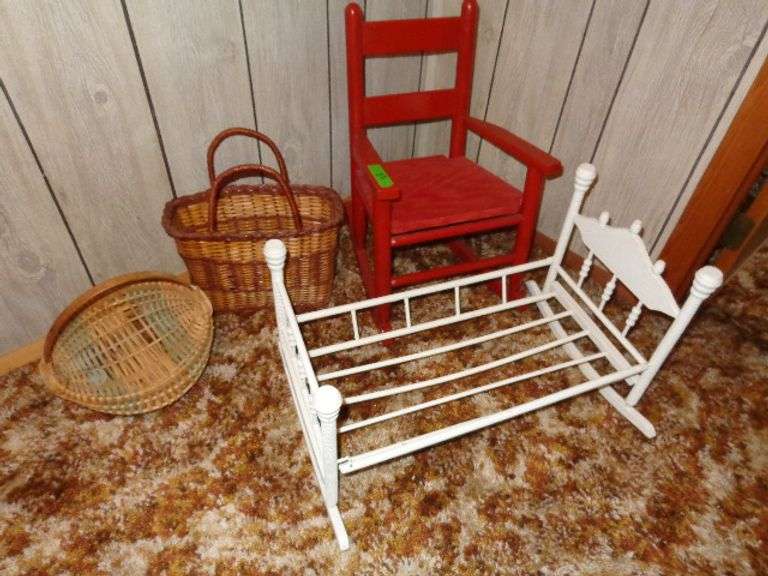 Red child's rocking chair, 2 baskets, doll cradle