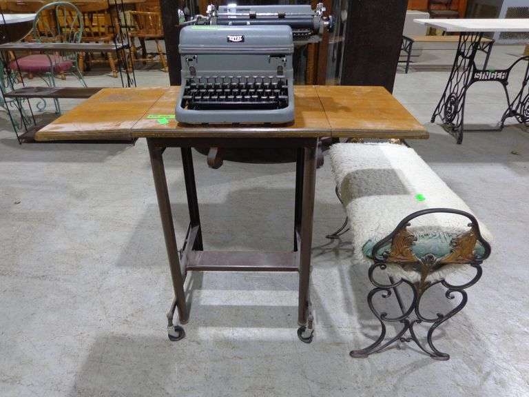 655- Vintage type writer table with Royal manual typewriter and small padded bench with iron frame