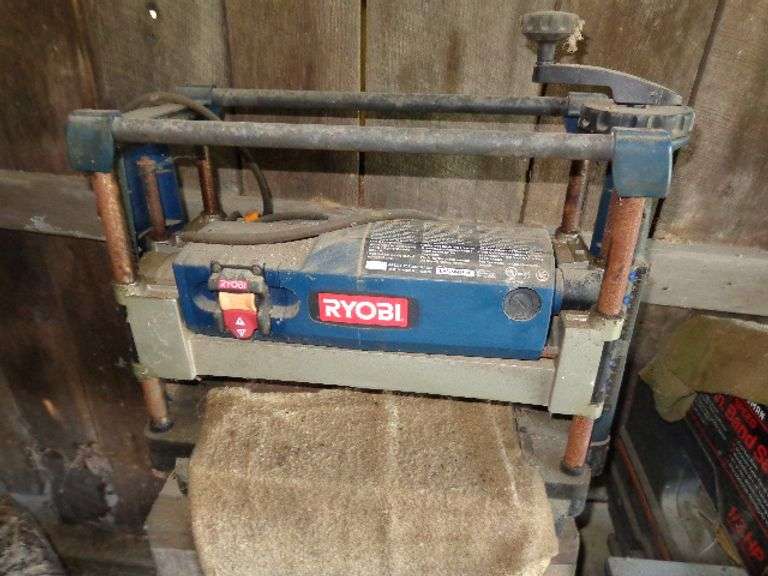Ryobi 12" Planer with Wood Stand. It is not mounted on stand. Untested. Located in old barn.