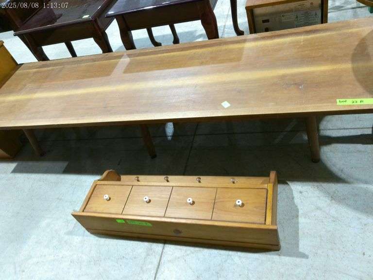 604 - Long coffee table 6 feet long 14" tall 21" wide and wall shelf with storage, coat pegs and wal