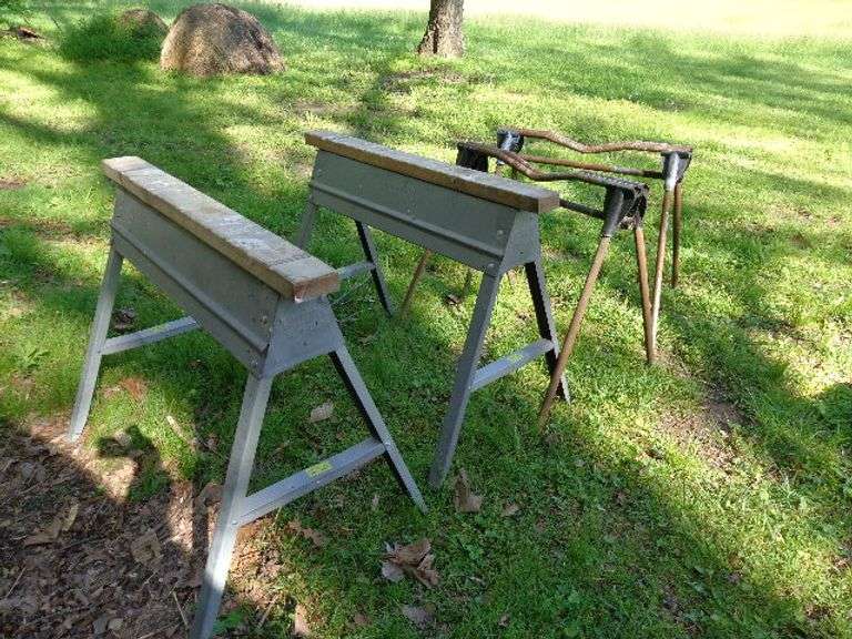 4 Saw Horses. Located in old barn.