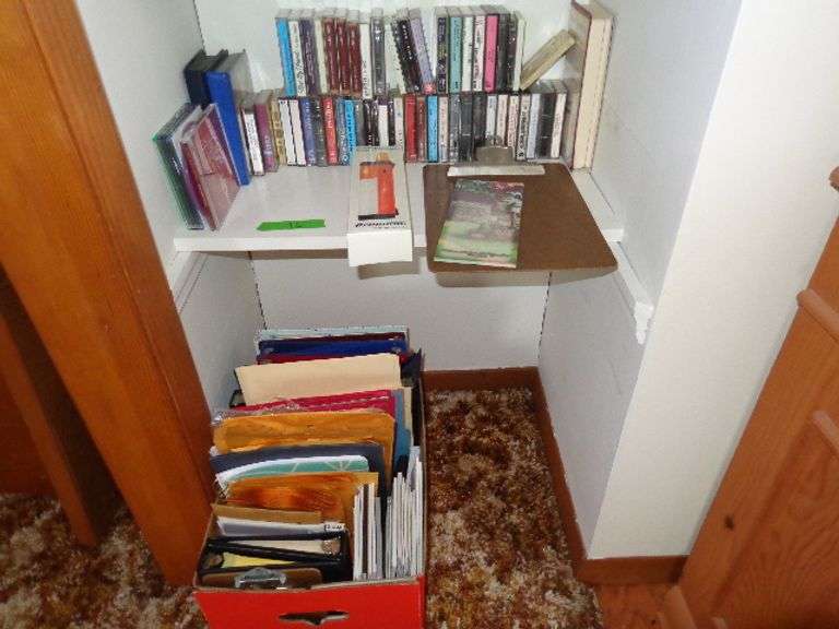 Group of cassette tapes, 3-ring binders, miscellaneous office paper