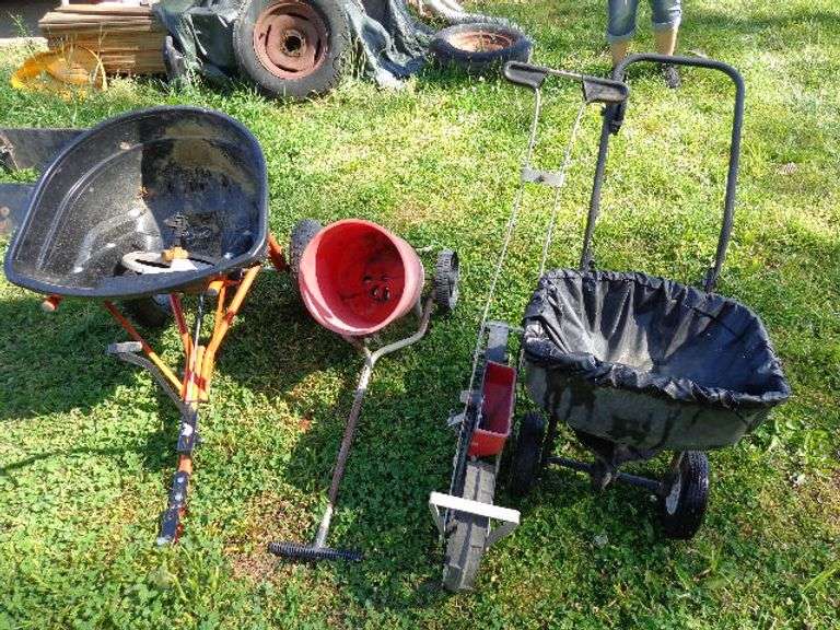 Agrifab pull behind lawn spreader, 2 other pull behind lawn spreaders, and an Earthway single row pl