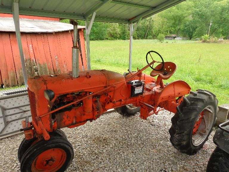 Allis-Chalmers Tractor. All tires weathered and cracked but holding air. This tractor runs and drive
