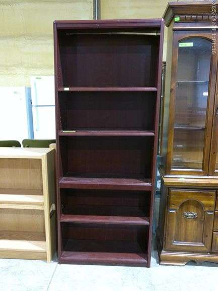 603 – bookshelf with for adjustable shelves. 72 inches tall, 11 inches deep, 29 inches wide. Made of