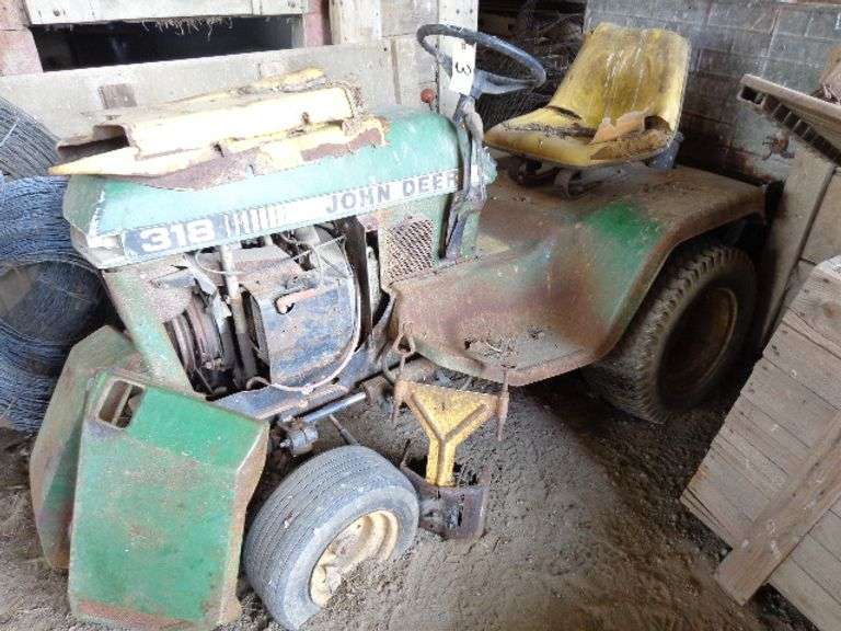 John Deere 318 riding mower been sitting in barn several years, with 2 mower decks