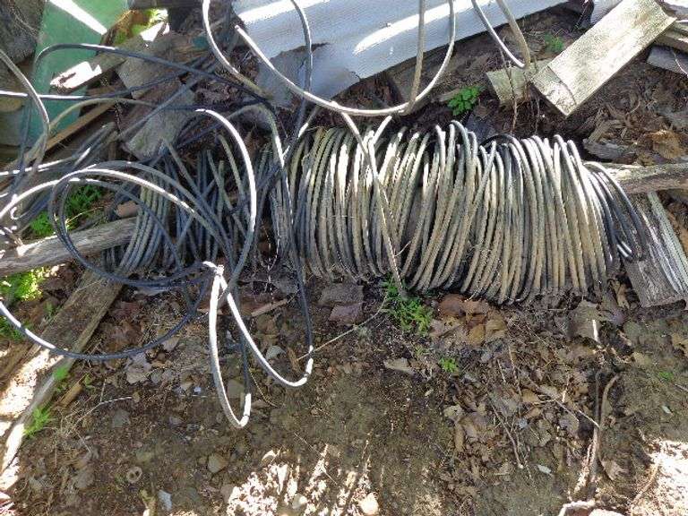 One Roll of Coated Aluminum Wire. Located by corn crib.