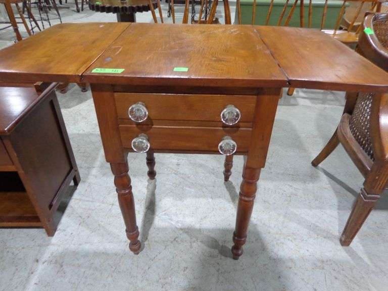 655- Wooden drop leaf side table with turned legs and glass knobs, 38" with leaves up