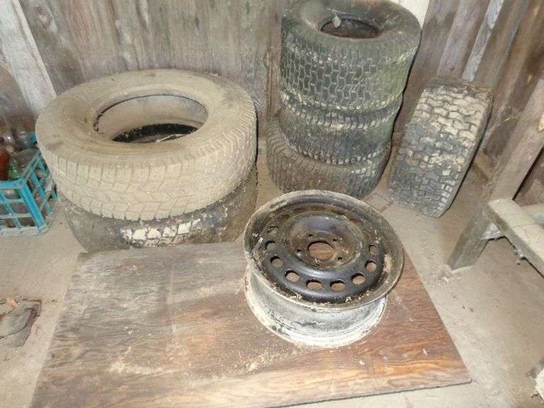 Miscellaneous lawn mower tires, 2 other tires that are 45x75x16. Condition unknown. Rim and 4 wheel 