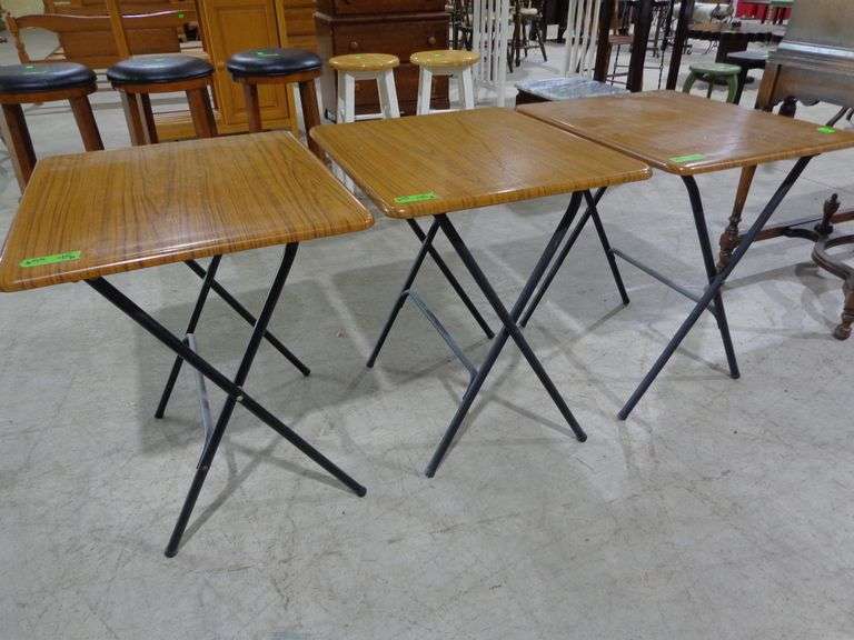 655- 3 matching metal based collapsible tables, tops are 24" by 20"