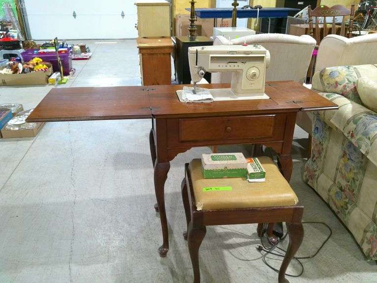 609- vintage Singer sewing machine and in cabinet with stool and attachments