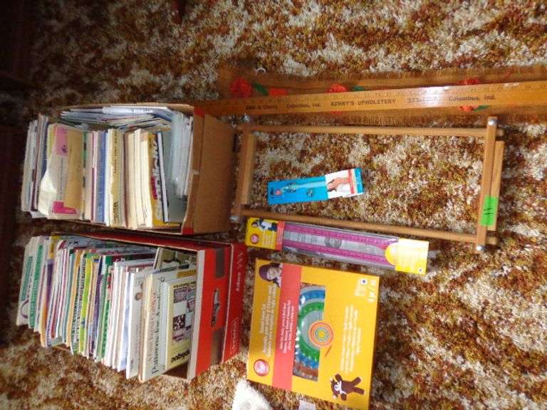 2 boxes of quilting and sewing books, round loom, yard stick from Kenny,s Upholstery Shop, Columbus,