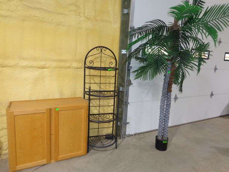 660- Black metal plant stand with 4 shelves, wooden and particle board garage cabinet ( no top), and