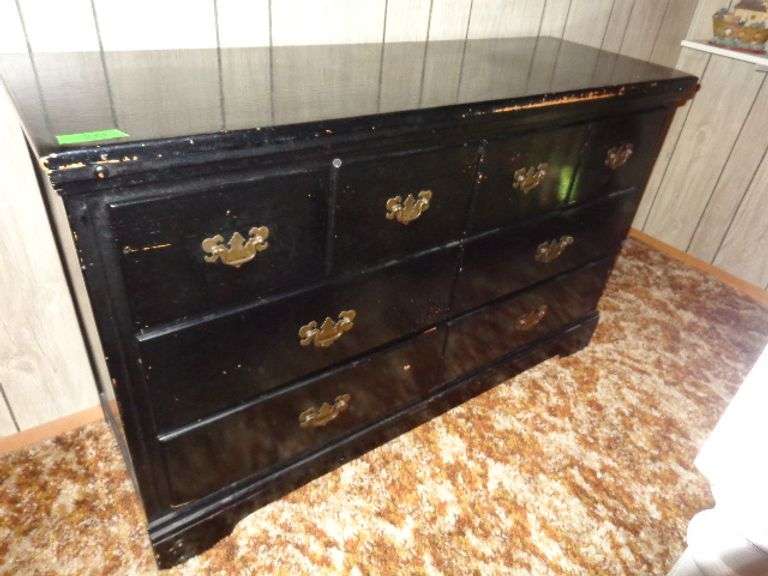 Black chest with 6 drawers, some wear. Drawers work very nice
