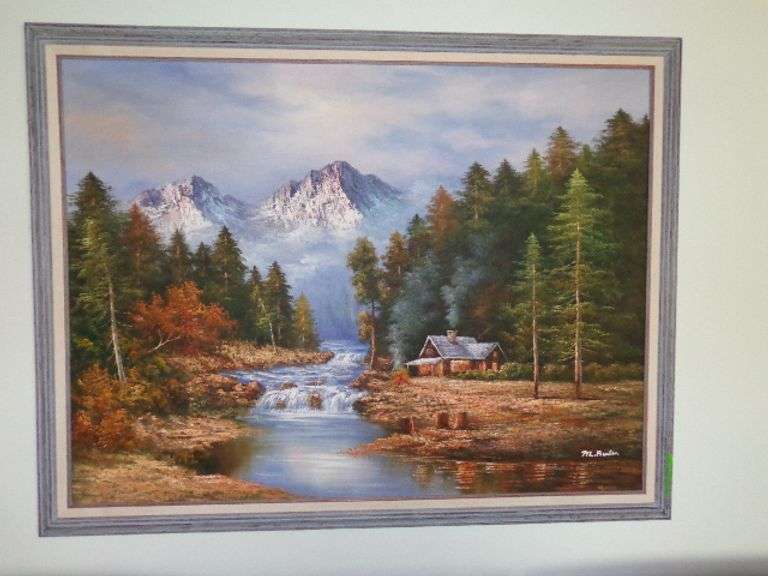 Large cabinet mountain scene picture with gray frame.