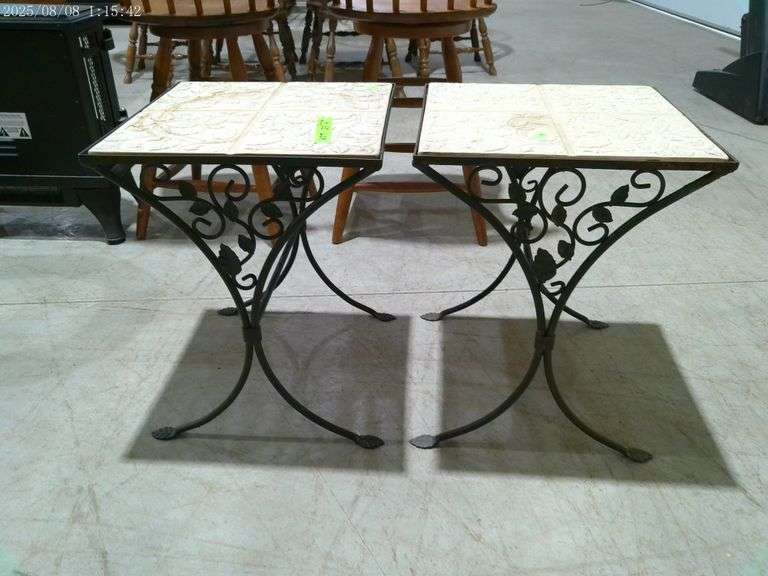 607- 2 tables with ceramic tops and iron legs 17" by 17" 21 " tall