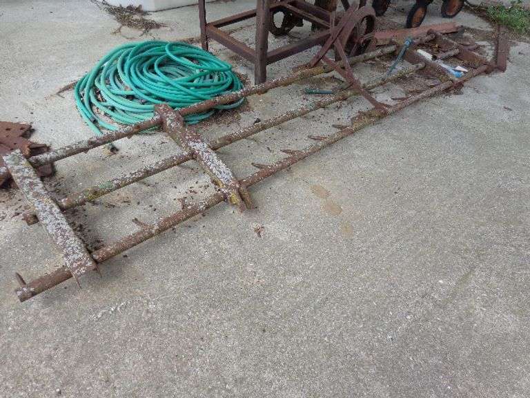 Homemade metal cart, harrow section damaged, 4 wheel wagon, contents of wagon not included
