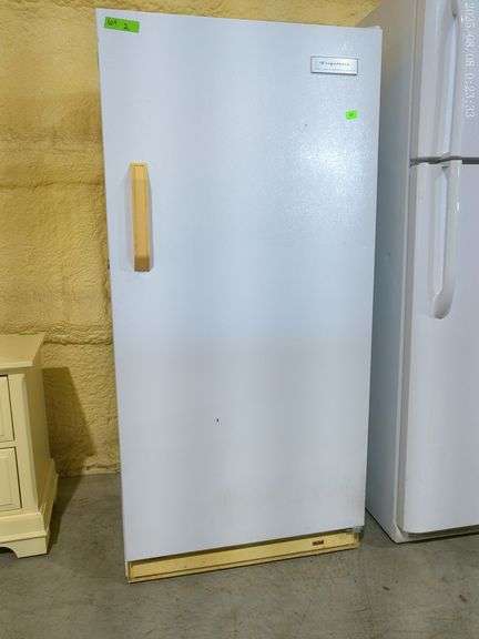 611 – Frigidaire frost free commercial freezer upright. In working condition