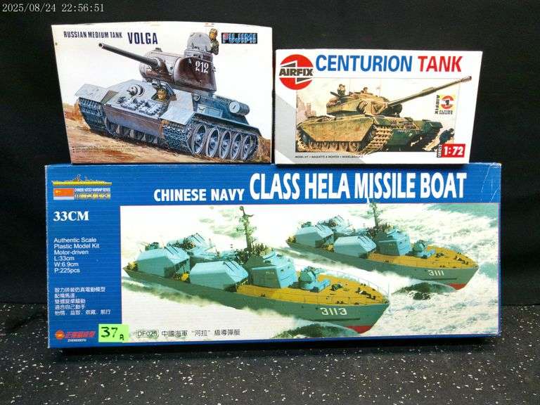 Chinese Navy missile boat and two tank models. See photos for details.