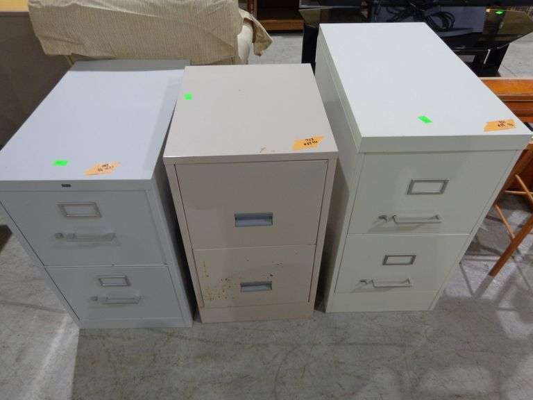 752 - 3 two drawer file cabinets (one has some rust), drawers work well