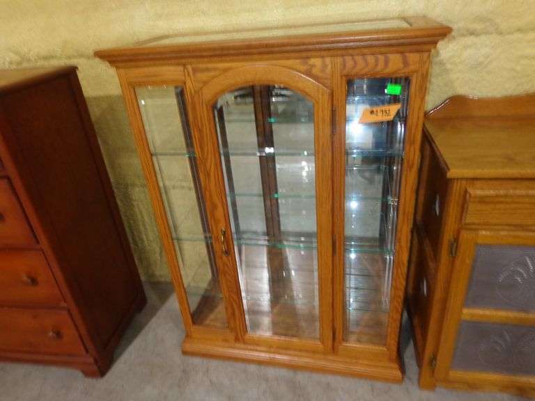 752 - Oak display case with 3 glass shelves and mirror. Excellent condition 32"W, 14"D, 48"H