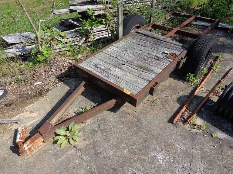 Small utility trailer, 9 feet long 3 feet wide, missing some wood boards