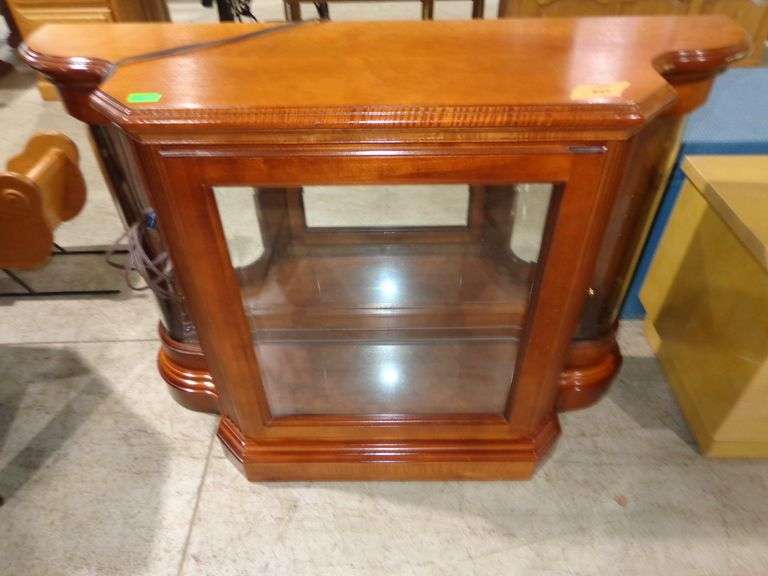 752 wood and glass display case with mirror. Is lighted and opens from the back. 41"W, 13"D, 30"H