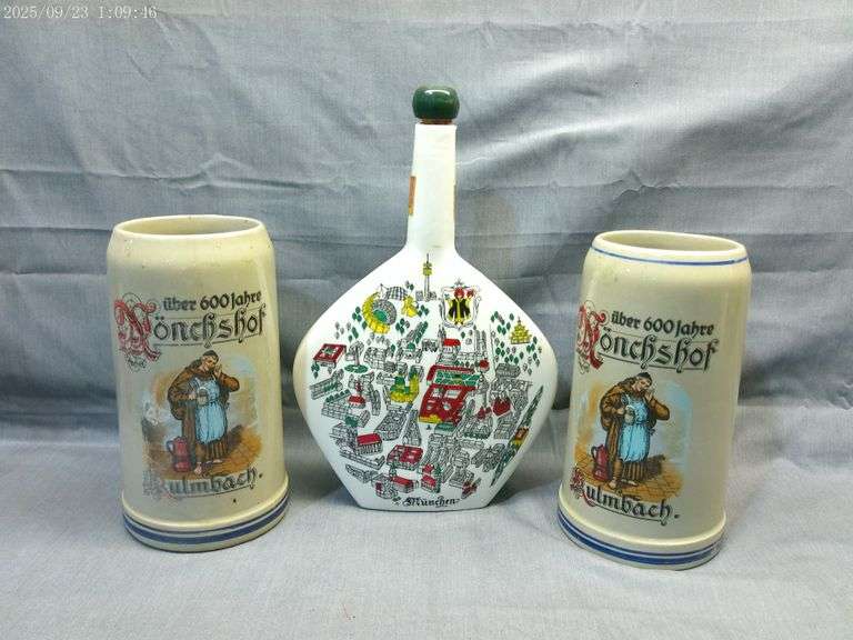 2-one liter beer advertising steins and a wine bottle from Munich