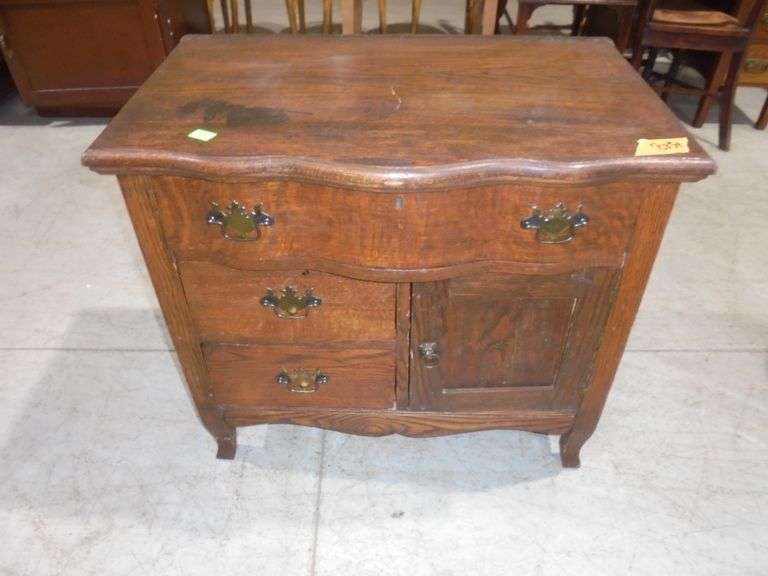 Vintage wash stand with 3 drawers and a door. 31" wide x 20" deep x 28" tall. See pictures.