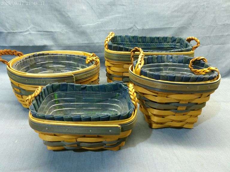 4 Longaberger baskets with blue weaving and leather braided handles