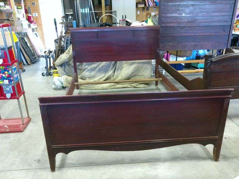 Antique full size bed. Headboard is 57"W x 47"T. Footboard is 57"W x 26"T. Has slats