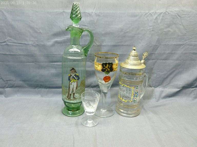 4 glass drinking vessels