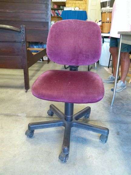 Maroon rolling, swivel, padded office chair