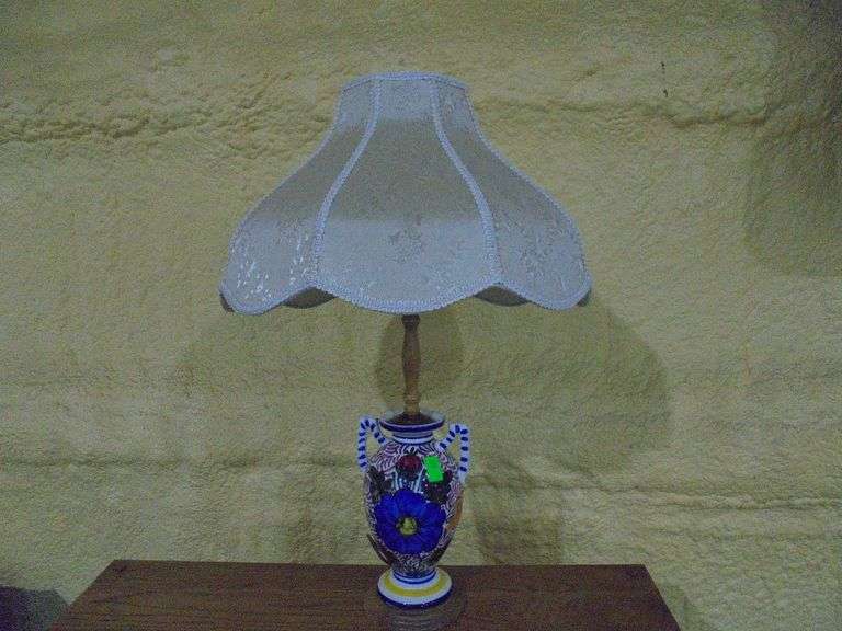 Porcelain table lamp. Works. 26" tall. See pictures.