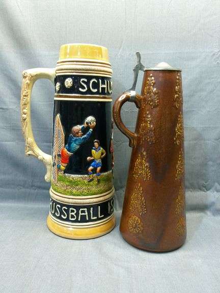 1.5 liter contemporary Seigberg style stein and 2 liter soccer stein