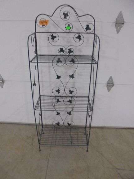 Wire plant stand with 3 shelves. Green. Folds up for easy storage. See pictures.