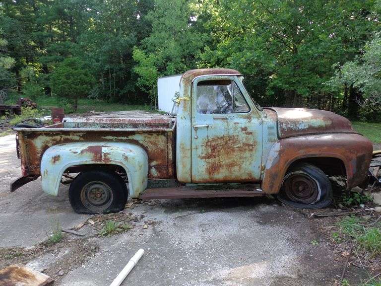 1955 Ford custom cab truck, busted windows, bad tires. Does not run.